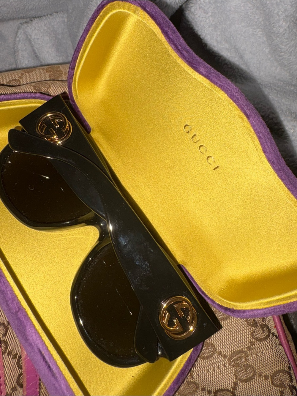 Gucci Black Sunglasses with Gold Logo and purple /yellow case